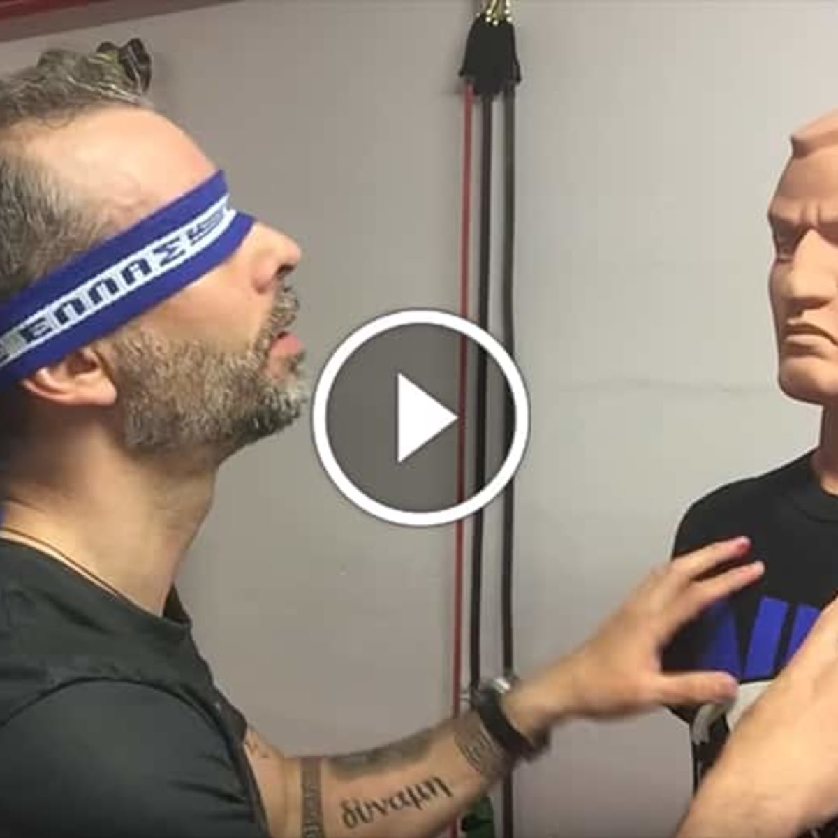 Blindfolded martial arts master slams SLEDGEHAMMER into