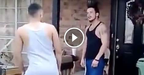 Two guys with no business fighting brawl on the street