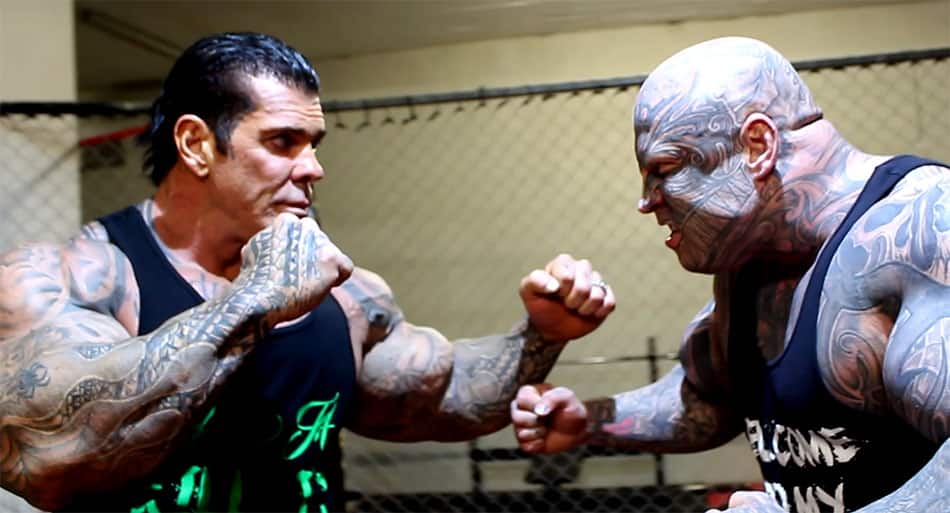 Cage fight between two GIANT body builders