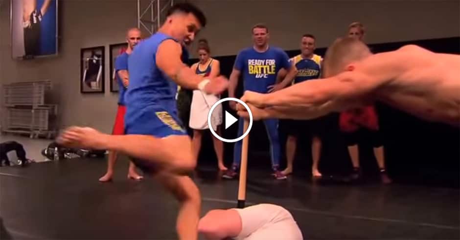 Ao8’s Coach Mel attempts to break a bat with his shin