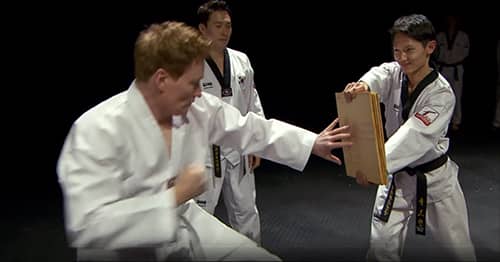 Conan O’Brien learns Taekwondo – tries to break 5 boards with bare hands