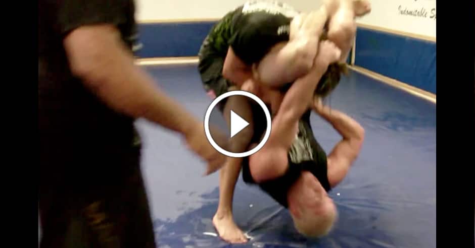 Cris Cyborg slams Tito Ortiz to the mat during training session