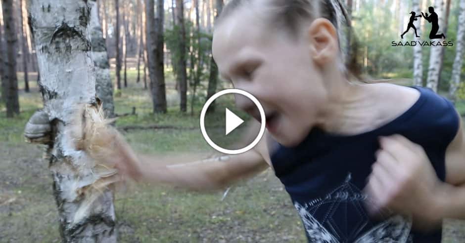 Evnika tries to cut down a birch tree with punches