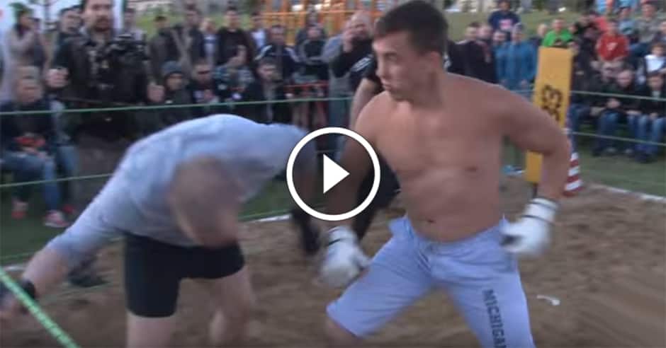 Fan in crowd tries his luck in the ring