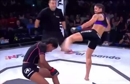 Female MMA fighter wins with vicious triple head kick KO