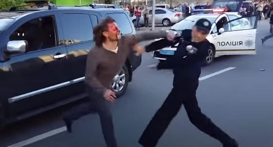 Former Olympic wrestler battles seven police officers