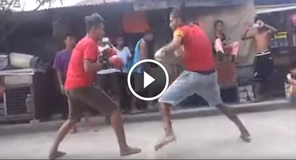 Gloved street fight ends in brutal KO
