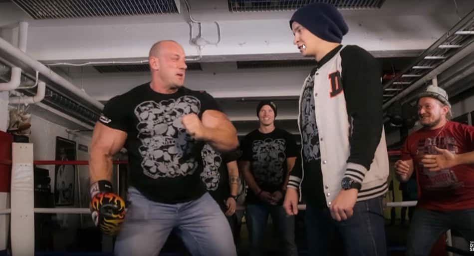 Guy attempts to take hardest punch from giant bodybuilder