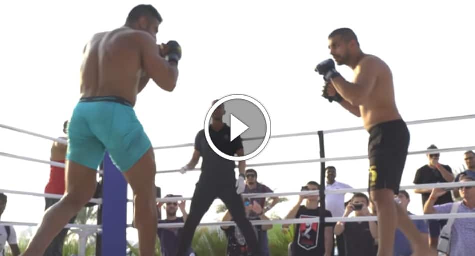 HUGE bodybuilder vs kickboxer in MMA bout – does not last long