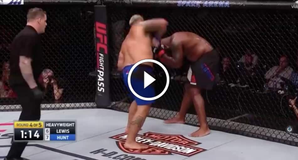 Hunt TKOs Lewis in 4th round