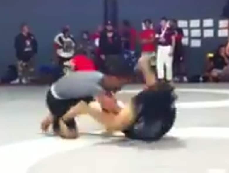 Crazy Imanari roll to knee bar!