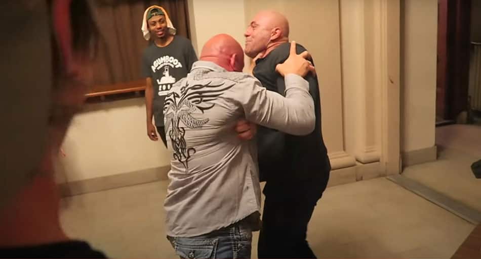 Joe Rogan and UFC legend Mark Coleman in playful scuffle at UFC 203