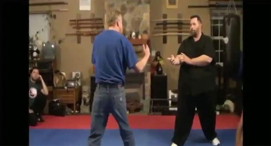 Skinny karate black belt challenges 350-pound Wing Chun instructor during seminar