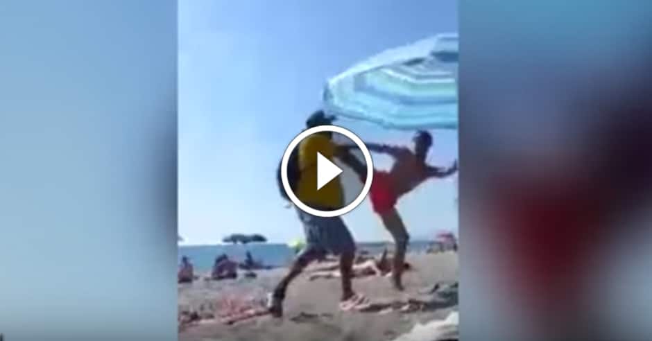 Bully sunbather uses ‪‎karate‬ on beach vendor