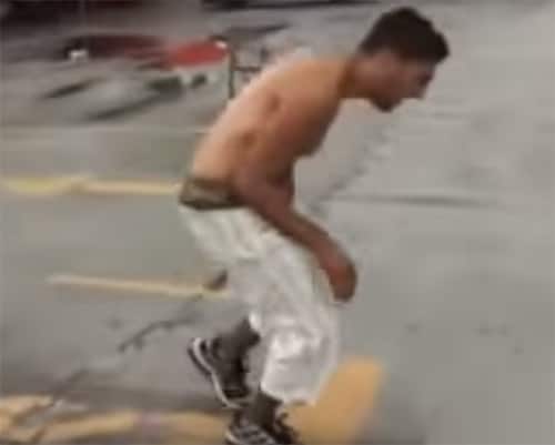 Kimbo Slice punches two guys in the gut – hard as he can