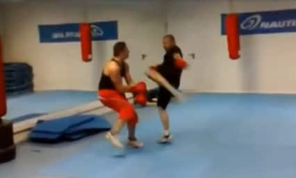 Dojo Storm: Foolish tough guy gets hit with a one-piece-and-soda kick by Sanda world champ