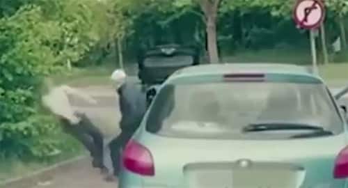 Martial artist tangles with 2 road-raging attackers at once