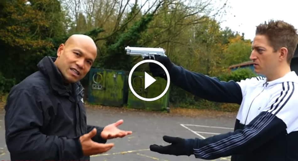 Master Wong shows how to defend against a hand gun