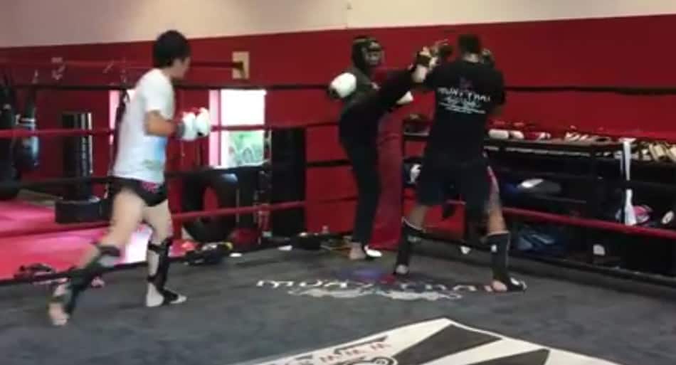 MMA star Cung Le spars two fighters at the same time