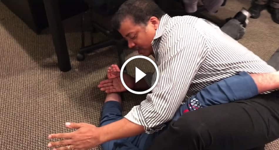 Astrophysicist Neil deGrasse Tyson teaches Matt Serra a cool move