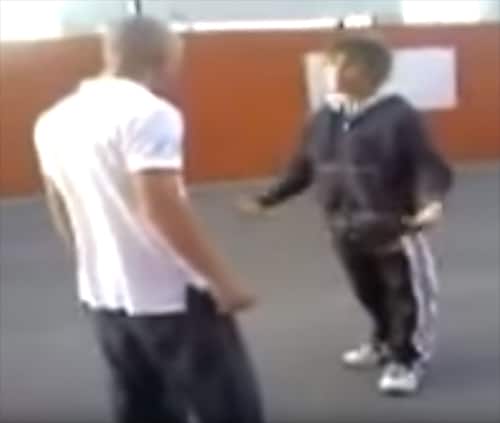Smaller kid tries to end confrontation quickly