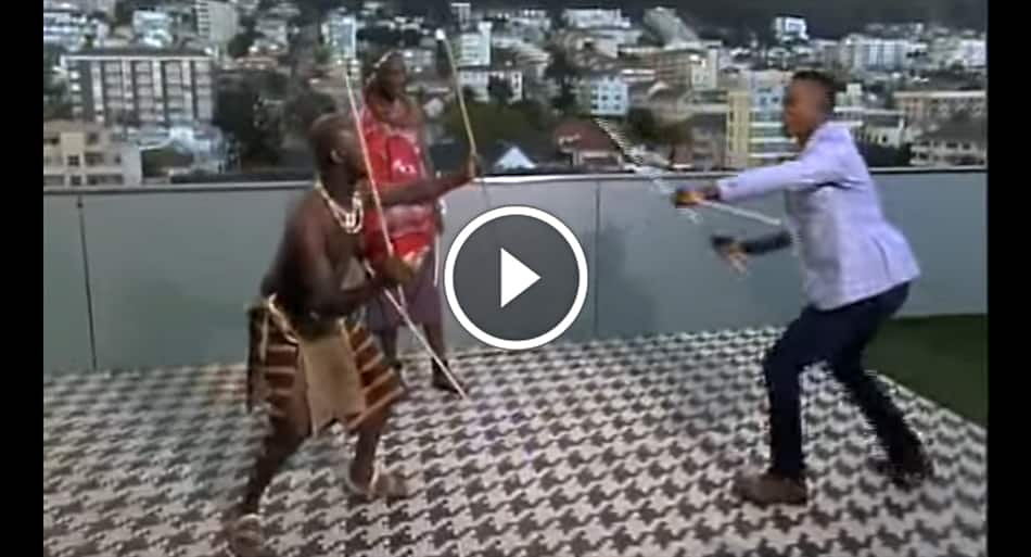 Enthusiastic interviewer battles tribal stick fighter