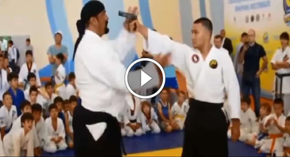 Steven Seagal shows how to defend against a gun