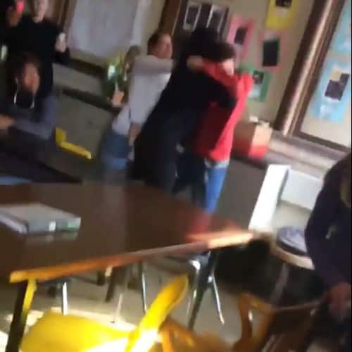 Student comes to the aid of teacher caught in a brawl