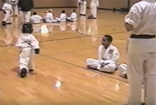 Tiny karate kid defends girl sparring against instructor