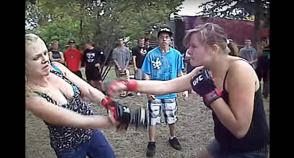 Tiny woman goes OFF in backyard brawl