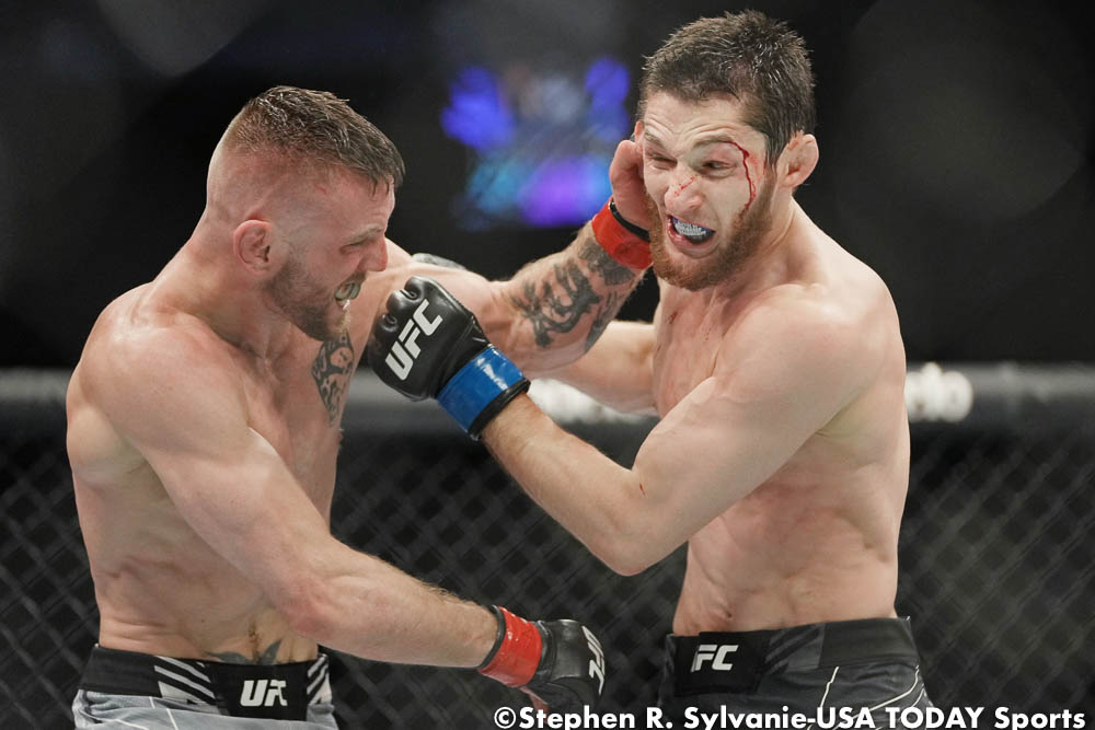 UFC 272 photos: Tim Elliott def. Tagir Ulanbekov