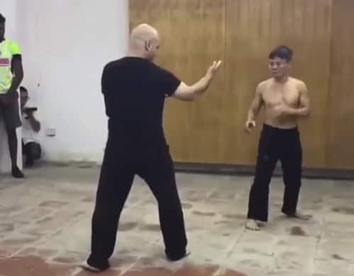 Wing Chun master vs. karate blackbelt challenge match – ends BRUTALLY