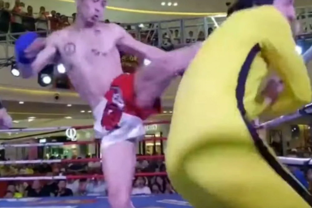 Wing Chun master dons Bruce Lee tracksuit, challenges MMA fighter for 150k
